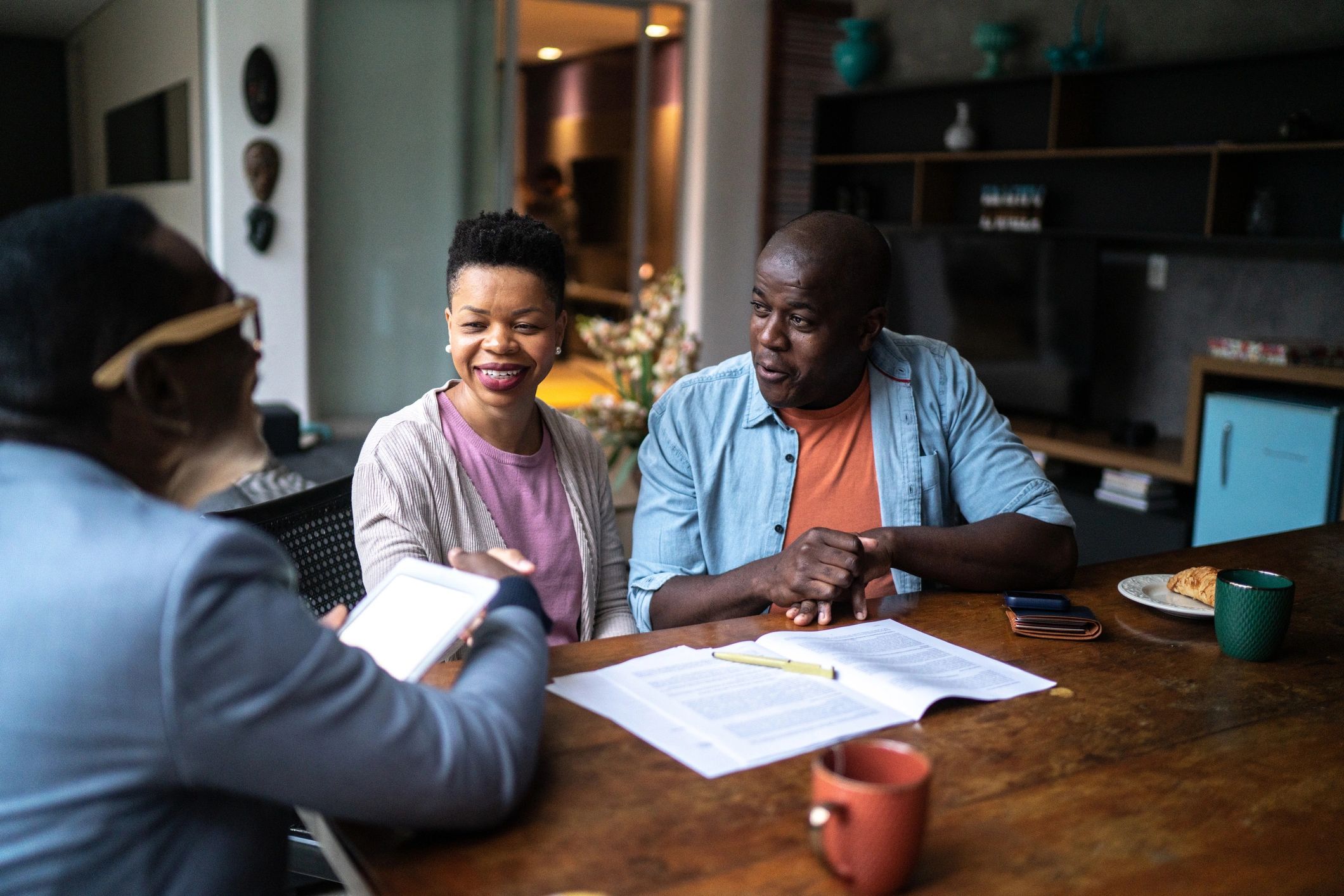 Homeowners meeting with a service professional